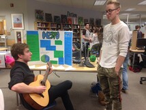 Students playing guitar 